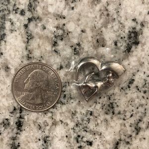 Small metal dog charm